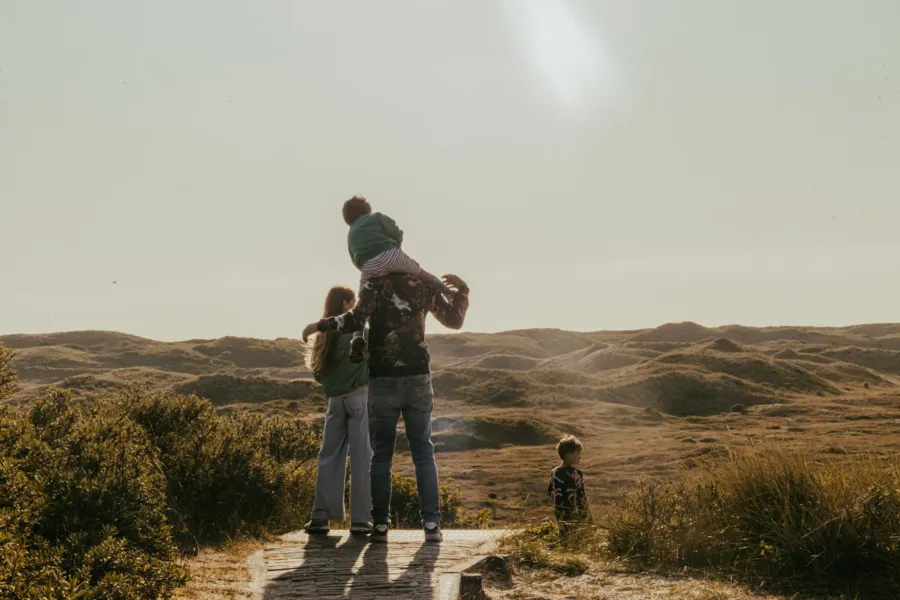 Duinen uitzicht gezin